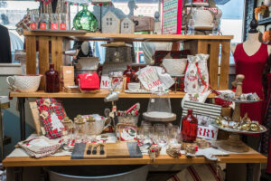 holiday gifts for the kitchen and holiday on three shelves in green front's accessories, inc building