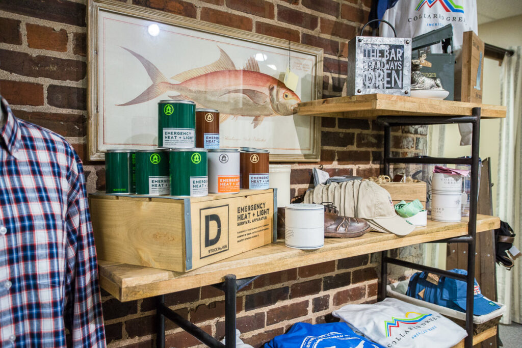 emergency heat and light candles in front of a framed picture of a fish