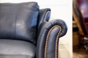 hammered detail on Leather Couch in Green Front showroom