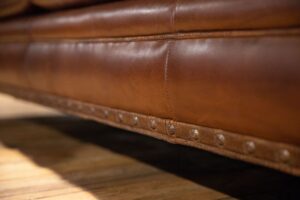 detailing on french style leather sofa