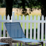 Tropitone chaise with blue fabric