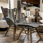 woven outdoor chair and table with wooden legs