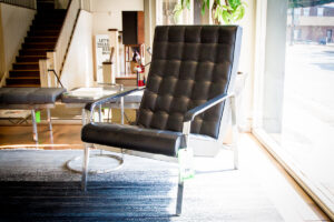 contemporary chair with black quilted leather and chrome accents