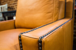 orange chair with dark metal details