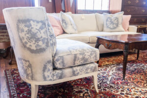 cream patterned upholstered chair and couch