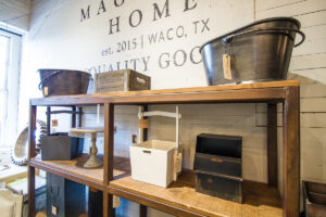 wooden storage boxes on light brown shelves