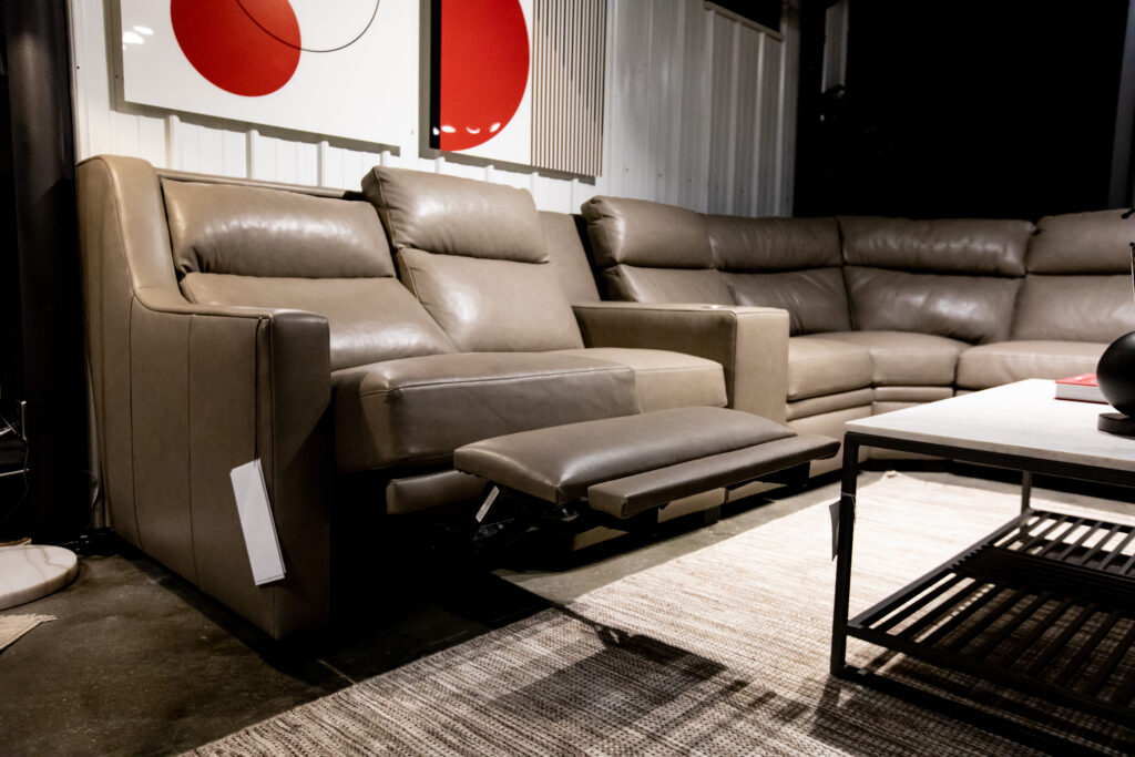 tan leather reclining sectional couch