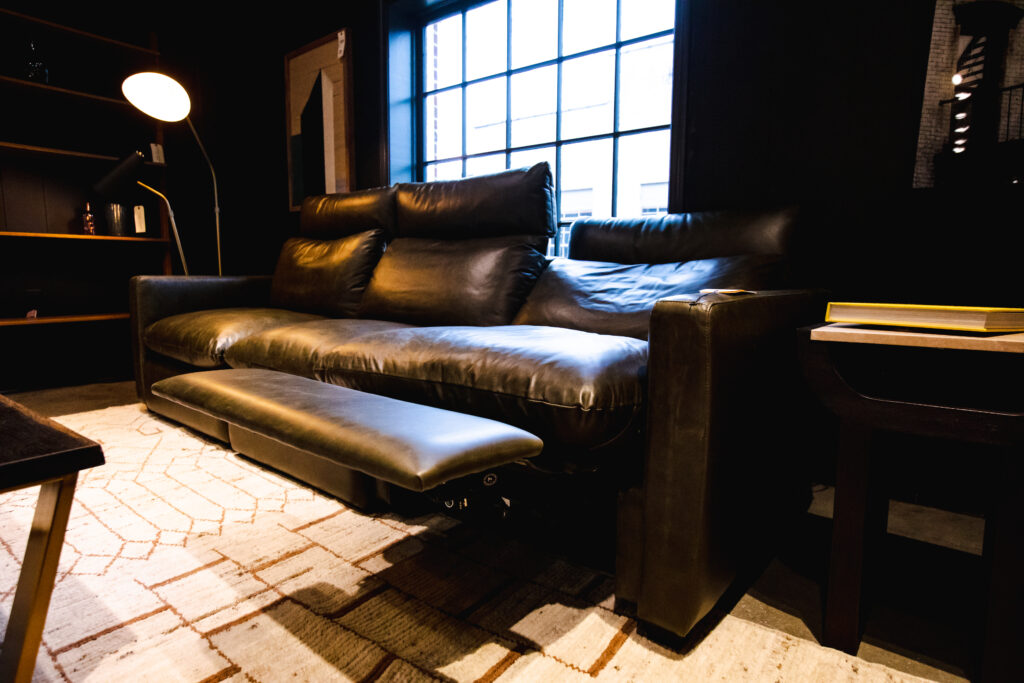 black leather reclining sofa