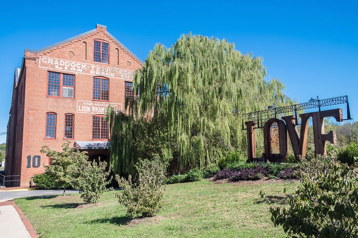 Exterior of a furniture stores in Farmville Va that has a curated furniture selection of handcrafted furniture